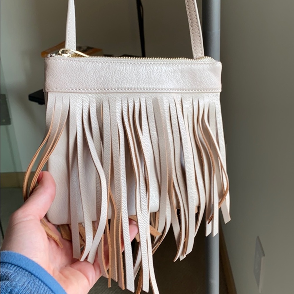 Nude fringe cross body bag